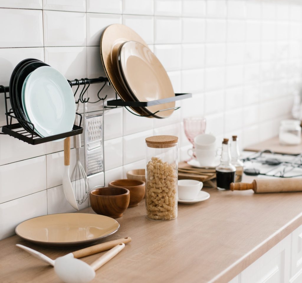 kitchen utensils are on the cabinet the interior of the room in the scandinavian style